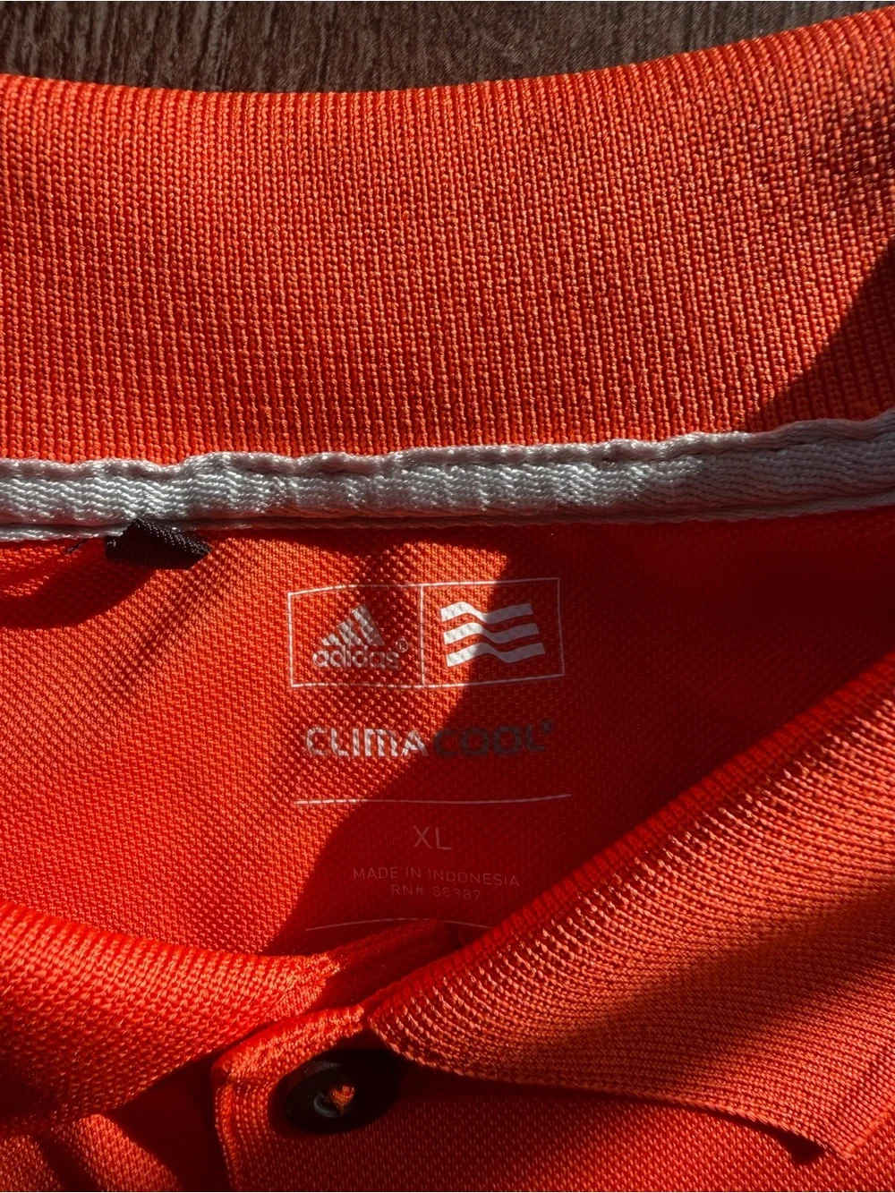 adidas Orange Short-Sleeve Polo with Three-Stripe Accent